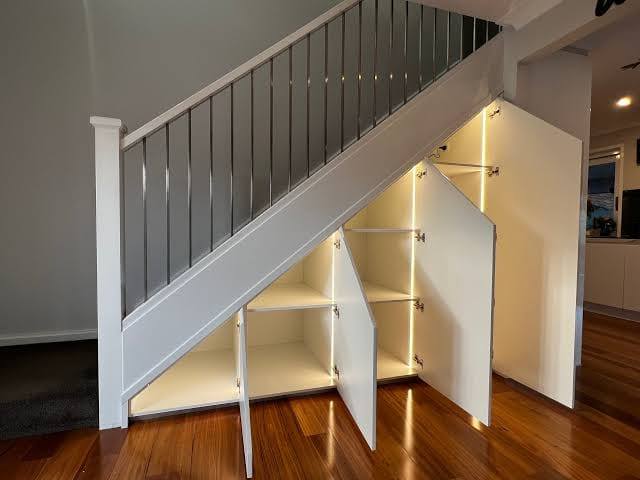 Under-stair cabinetry with lighting