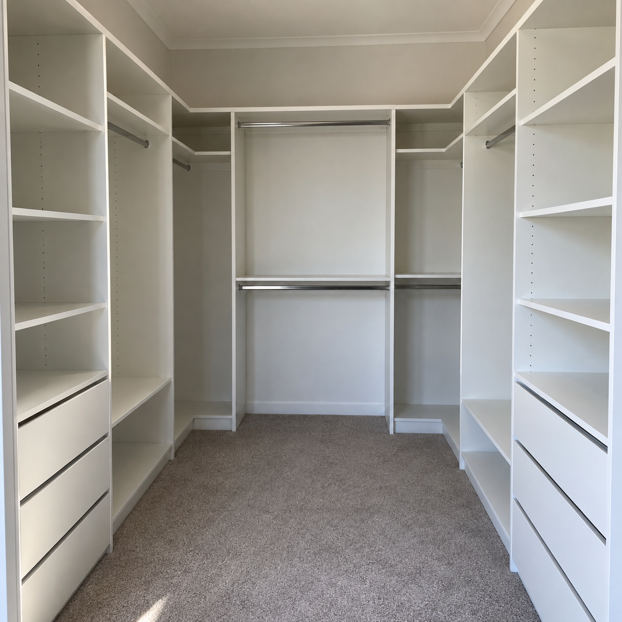 Generated design example: White walk-in wardrobe with open hanging sections and drawers