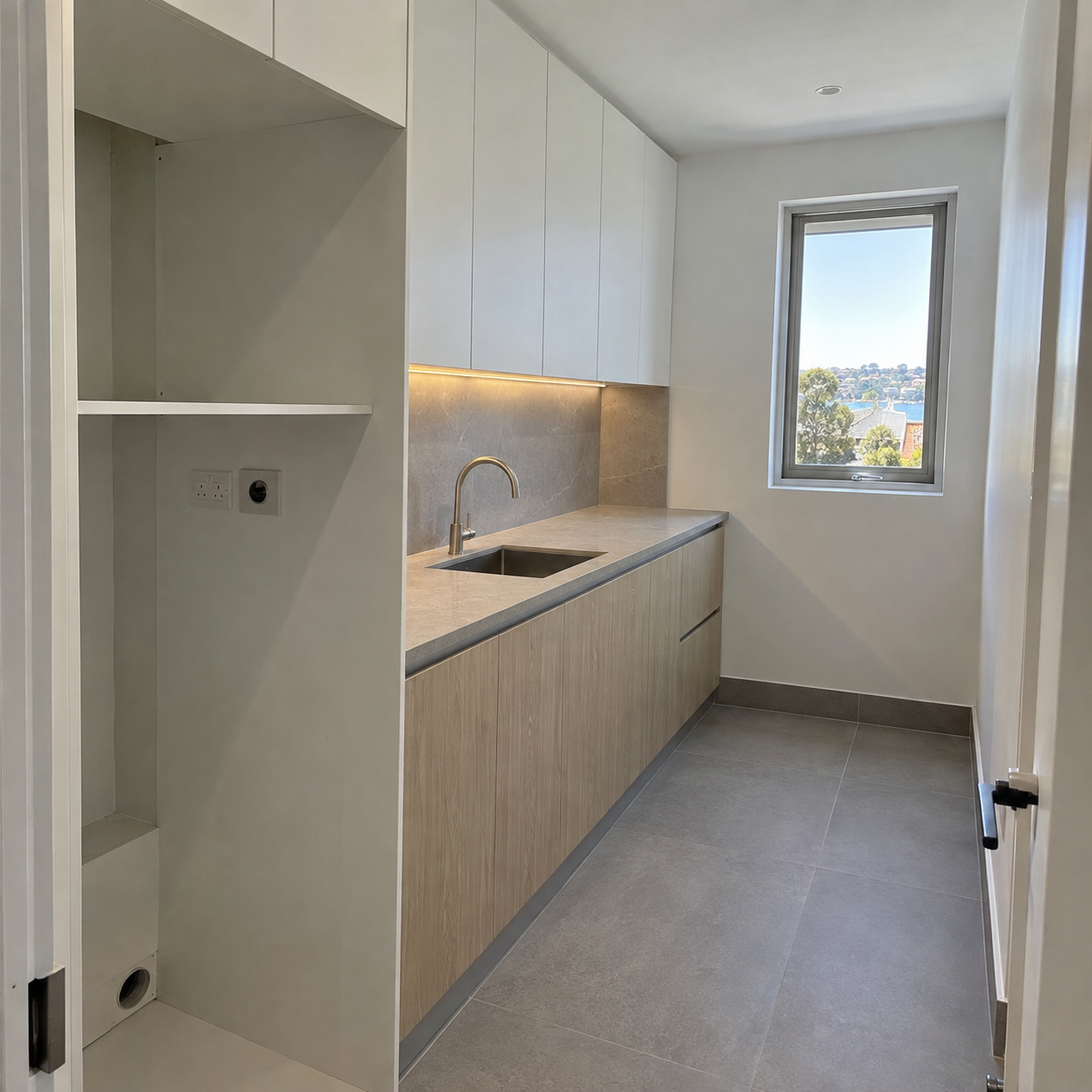 Compact laundry design showcase showing custom cabinetry