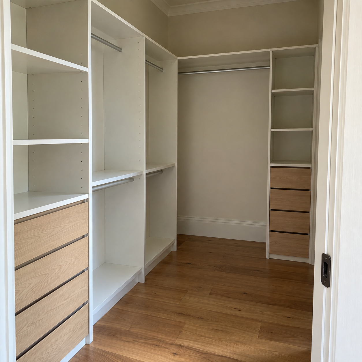 Walk-in storage style example showing custom cabinetry